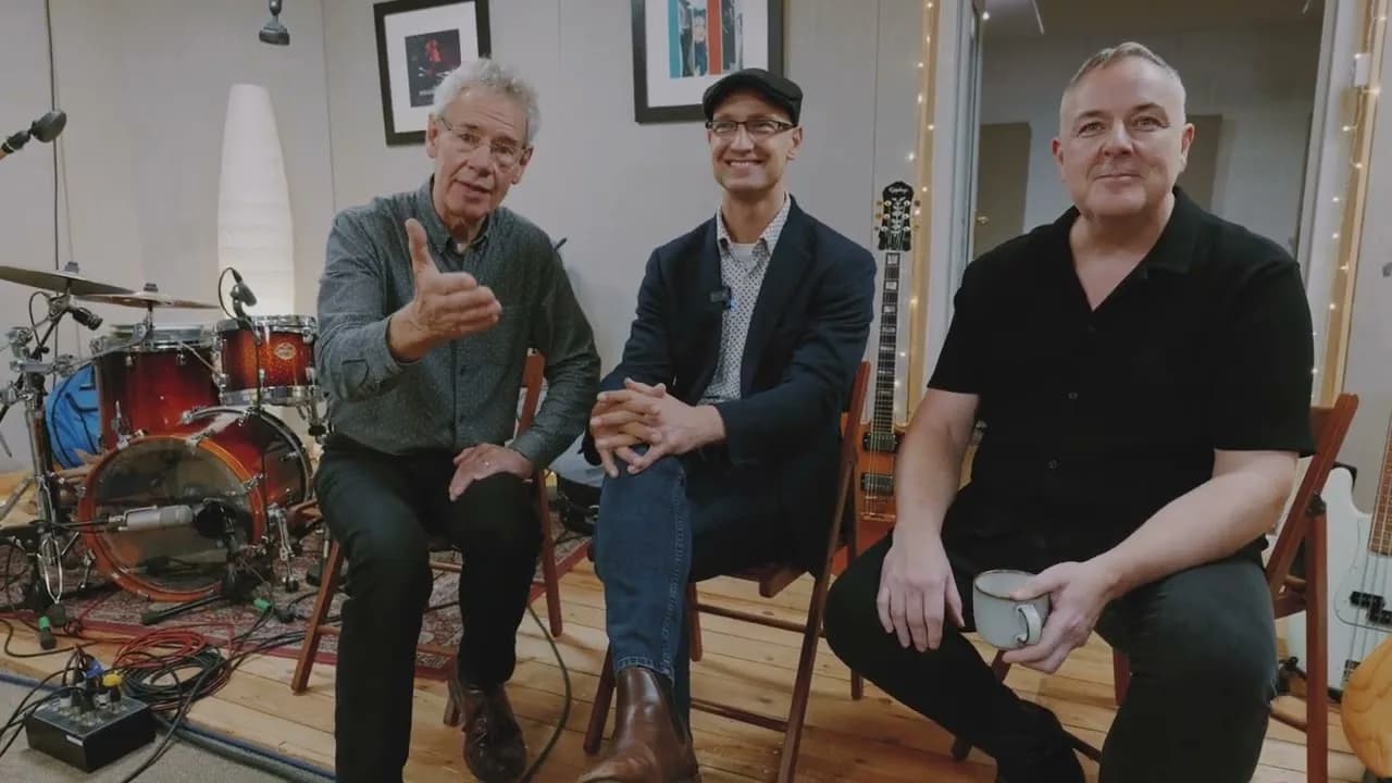 Pete Roth, Mike Pratt, and Bill Bruford seated together in the Pete Roth Trio EPK.